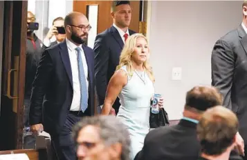  ?? JOHN BAZEMORE AP ?? U.S. Rep. Marjorie Taylor Greene enters the courtroom April 22 in Atlanta, where she testified that she had no role in the attack on the Capitol and rejected claims that she shouldn’t be allowed to run for re-election.