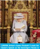  ?? — AFP ?? LONDON: Britain’s Queen Elizabeth II reads the Queen’s Speech on the Sovereign’s Throne in the House of Lords chamber during the State Opening of Parliament at the Houses of Parliament in London yesterday.