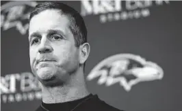  ?? GAIL BURTON/AP ?? Ravens coach John Harbaugh speaks after a 23-17 loss to the Chargers in an AFC wild-card game on Sunday. The Dolphins could explore a trade to acquire Harbaugh’s services.