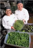  ?? JOHN MANIACI ?? Sous chef Lisa Boté (left) and executive chef Ellen Ritter display salad greens that are purchased from Wisconsin farmers for the UW Hospital food service.