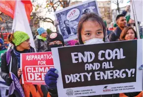  ?? Photo: Omar Marques ?? People at the COP24 UN climate change conference in Katowice, Poland, where Australia has been criticised for its ‘addiction to coal’.