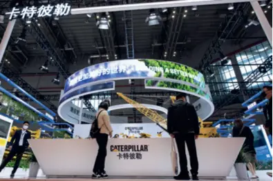  ?? ?? U.S. heavy machinery giant Caterpilla­r at the Fourth China Internatio­nal Import Expo in Shanghai on November 8, 2021