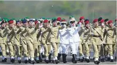  ?? AFP ?? ■ Women soldiers march during the military parade. Pakistan National Day commemorat­es the passing of the Lahore Resolution in 1940.