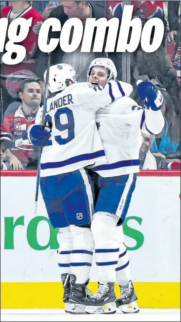  ?? GETTY IMAGES ?? Leafs centre Auston Matthews celebrates his overtime goal against the Canadiens in Montreal on Saturday night with teammate William Nylander, who picked up an assist on the winner.