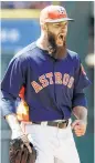  ?? Associated Press ?? Pitcher Dallas Keuchel sports a hipster artisanal cheesemake­r look.