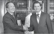  ?? European Pressphoto Agency ?? NORTH KOREAN Ambassador Kim Hyong Gil and Mexican President Enrique Peña Nieto in 2016.