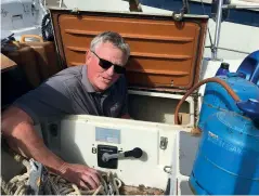  ??  ?? LEFT Surveyor Ben climbs in to inspect the deep port locker