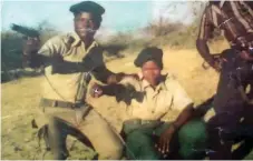  ??  ?? Cde Nditsheni Dube (left) with fellow combatants at St Paul’s Assembly Point in Lupane