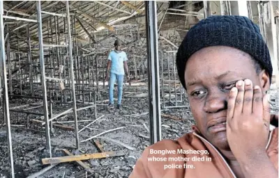  ?? /PHOTOS/ANTONIO MUCHAVE ?? Bongiwe Masheego, whose mother died in police fire.
Charred remains of the local Ackermans and Pick'n Pay which were looted and burned during a community protest in KwaGuqa, Emalahleni.