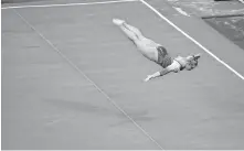  ?? [SARAH PHIPPS/ THE OKLAHOMAN] ?? OU's Ragan Smith performs in the floor routine Sunday in Norman.