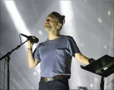  ?? ASSOCIATED PRESS FILE ?? Thom Yorke of the band Radiohead performs in concert during their “A Moon Shaped Pool Tour” at The Wells Fargo Center in July in Philadelph­ia. Radiohead, an alt-rock giant, is among recently released nominees for induction into the Rock &amp; Roll Hall of Fame.