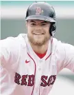  ?? AMENDOLA/AP ELISE ?? The Red Sox’s Christian Arroyo celebrates his RBI double in the fifth inning against the Rays at Fenway Park on Wednesday in Boston.