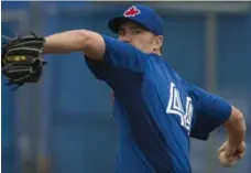  ?? RICK MADONIK/TORONTO STAR ?? Casey Janssen, the Jays’ presumptiv­e closer, is suffering from soreness in his throwing arm and may not be ready to travel north with the team.