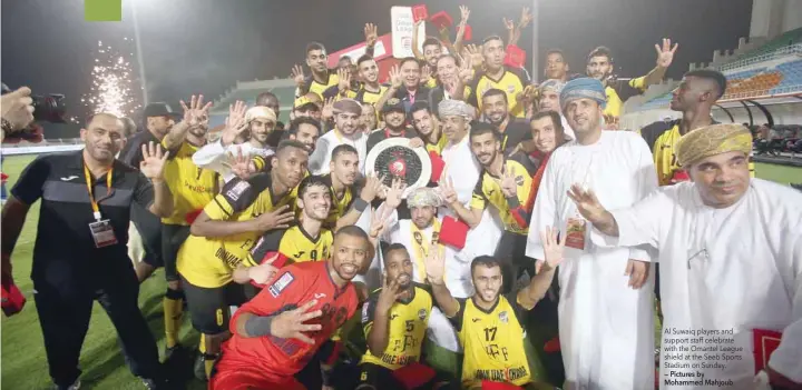  ?? — Pictures by Mohammed Mahjoub ?? Al Suwaiq players and support staff celebrate with the Omantel League shield at the Seeb Sports Stadium on Sunday.