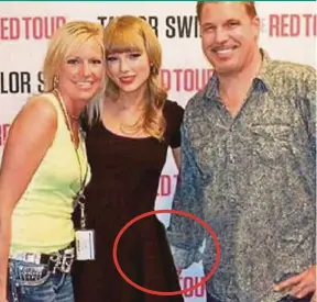  ?? DM PIC ?? The photo, repeatedly displayed in court, showing Taylor Swift flanked by David Mueller and Shannon Melcher. Mueller has his right hand concealed behind Swift’s back, and she appears to have shifted her hip away from him.
