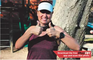  ??  ?? Siân Venter gives a thumbs up after finishing her 5km run
Photo: Richard Springorum