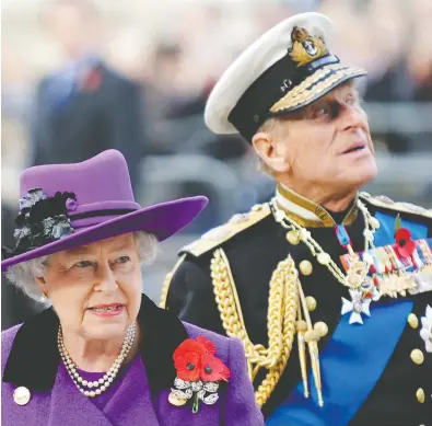  ?? ADRIAN DENNIS / AFP / GETTY IMAGES ?? Britain's Queen Elizabeth II credits Prince Philip, her husband of nearly 70 years, for supplying her with constant
love and help in her efforts to remain true to the idea of always listening to the people she leads.