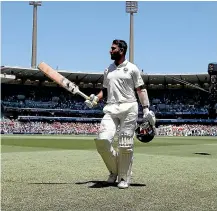  ?? AP ?? Indian batsman Cheteshwar Pujara receives the crowd’s plaudits after being dismissed for 193 against Australia on day two of the fourth test in Sydney yesterday.