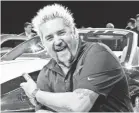  ?? USA TODAY FILE PHOTO ?? Guy Fieri’s “Diners, Drive-Ins and Dives” runs on the Food Network, which is now part of Comcast’s Digital Starter package.