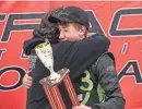 ?? DAVE KALLMANN / MILWAUKEE JOURNAL SENTINEL ?? Levon Van Der Geest, then 15, gets a hug from his father, Jay, after winning a race in 2019.