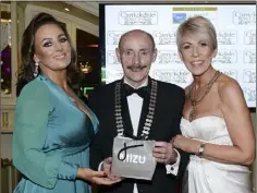  ??  ?? Best dressed lady winner Deirdre Deagon with Michael Gaynor Dundalk Chamber and Linda Stewart Mizu.