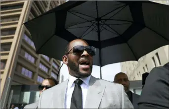  ?? AMR ALFIKY — THE ASSOCIATED PRESS FILE ?? In this Thursday file photo, musician building, in Chicago. R. Kelly leaves the Leighton Criminal Court