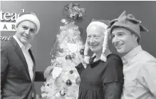  ??  ?? Saanich Mayor Richard Atwell, left, Saanich Coun. Karen Harper and Home Instead Senior Care owner Alistair Hicks at the launch of the Be a Santa to a Senior campaign.