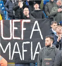  ??  ?? Manchester City fans with an anti-Uefa banner during a match on Wednesday.