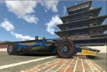  ?? Getty Images ?? Scott McLaughlin’s car touches the fabled bricks Saturday as part of his car’s win in the IndyCar virtual race run on the Indianapol­is Motor Speedway oval.