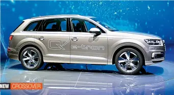  ??  ?? An Audi Q7 e-tron car is unveiled during a presentati­on at the 16th Shanghai Internatio­nal Automobile Industry Exhibition in Shanghai on Monday. The car is earmarked for only specific Asian markets.