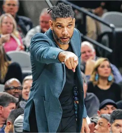  ?? Tom Reel / Staff photograph­er ?? Tim Duncan’s surprise move to become a Spurs assistant was a favor to Gregg Popovich, and his old coach will be forever grateful.