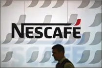  ?? STEFAN WERMUTH / BLOOMBERG ?? Nestle’s recently announced alliance with Starbucks underlines the efforts of the Swiss maker of Nescafe to capture more upscale java drinkers in the U.S.