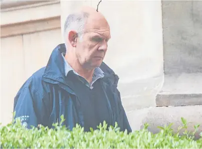  ??  ?? Charles Aitkenhead outside Dundee Sheriff Court where he admitted downloadin­g and possessing hundreds of indecent images of children.