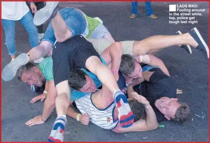  ??  ?? LADS MAD: Fooling around in the street while, top, police get tough last night