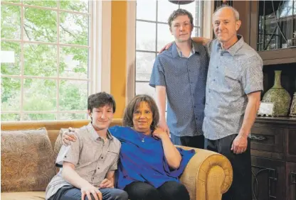  ?? PAT NABONG/SUN-TIMES FILE ?? Gail Fink, shown with her sons Ethan (left) and Elliot and her husband, Michael, recently received a life-saving kidney transplant — her second in the last 20 years. She’s now recovering at home.