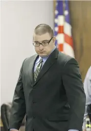  ?? LM OTERO/The Associated Press ?? Eddie Ray Routh walks to his chair in court after a break during his capital murder trial at the Erath County, Donald
R. Jones Justice Center Friday in Stephenvil­le, Texas.