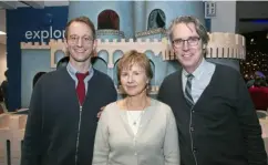  ?? ?? Andrew Fouts, left, Patricia Halverson and Scott Pauley in front of King Fridays Castle at WQED's Cardigan Party.