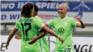  ??  ?? Pia-Sophie Wolter and Shanice van de Sanden celebrate a Wolfsburg goal