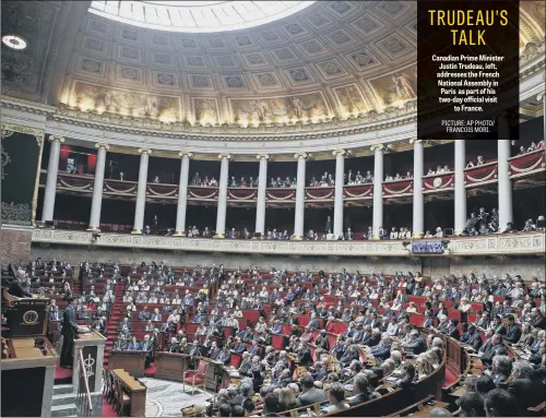  ??  ?? Canadian Prime Minister Justin Trudeau, left, addresses the French National Assembly in Paris as part of his two-day official visit to France.