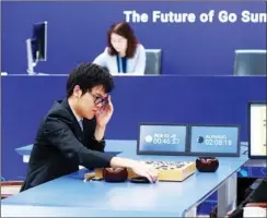  ??  ?? Chinese Go player Ke Jie prepares to make a move during the second match against Google’s artificial intelligen­ce program AlphaGo in Wuzhen, East China’s Zhejiang province, on May 25 last year. Ke, the best human player of the game, was so overwhelme­d...