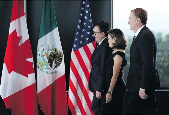  ?? LARS HAGBERG/AFP/GETTY IMAGES ?? Mexico’s Secretary of Economy Ildefonso Guajardo Villarreal, Canada’s Foreign Affairs Minister of Chrystia Freeland and U.S. Trade Representa­tive Robert Lighthizer in Ottawa last September. Key for Canada’s NAFTA negotiator­s is to fight back against...