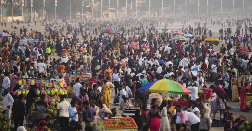  ?? ?? People crowd at the Juhu beach on the Arabian Sea coast in Mumbai, India, on Sunday. — ap