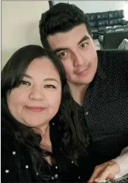  ?? MARIO BLANCAS VIA AP ?? In this December 2019 photo provided by Mario Blancas, he and his sister Zelene Blancas pose at a Christmas party in El Paso, Texas. In 2018, a video Blancas posted of kids from her first grade class hugging each other as they left at the end of the day went viral on Twitter. She died of COVID-19in December 2020.