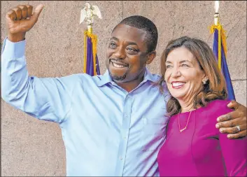  ?? Mary Altaffer The Associated Press file ?? State Sen. Brian Benjamin embraces Gov. Kathy Hochul during an event in Harlem, New York, after she made him lieutenant governor on Aug. 26.