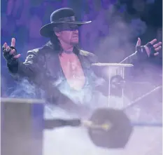 ?? ?? THE Undertaker will be inducted into the WWE Hall of Fame on April 1. In a 30 year career, he has undergone 12 surgeries. He is worth $17 million. | WWE