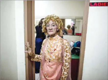  ?? NOEL CELIS/AFP ?? Street vendor and Golden Gays member Al Enriquez, 82, also known as ‘Carmen Dela Rue’, poses for a photo before the start of the Golden Gays of Manila Beauty Pageant at a restaurant in Manila.