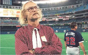  ??  ?? Kinsella at the Toronto ballpark: baseball was a common theme in his stories, as he liked exploring the boundless possibilit­ies of sport