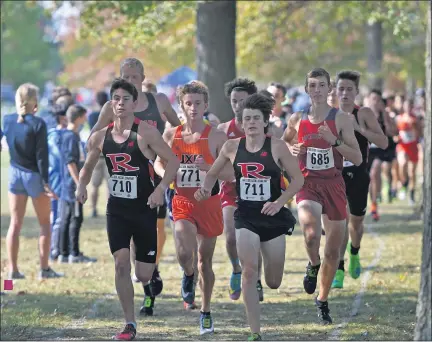  ?? PHOTOS BY DAVID DALTON — FORMEDIANE­WS GROUP ?? Zander Cobb (710) and Jack Kelke (711) set the pace for Romeo at the Macomb County championsh­ip meet at Freedom Hill on Friday. Cobb and Kelke helped the Bulldogs win a fourth straight championsh­ip.