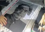  ??  ?? SOME SELLERS specialize in nostalgia, such as this machine-sewn portrait of ex-Premier Chou En-lai.