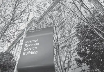  ?? J. DAVID AKE/ AP FILE ?? The IRS began sending out some checks Dec. 30 and money arrived in some bank accounts as of Jan. 4. But many taxpayers are still waiting.